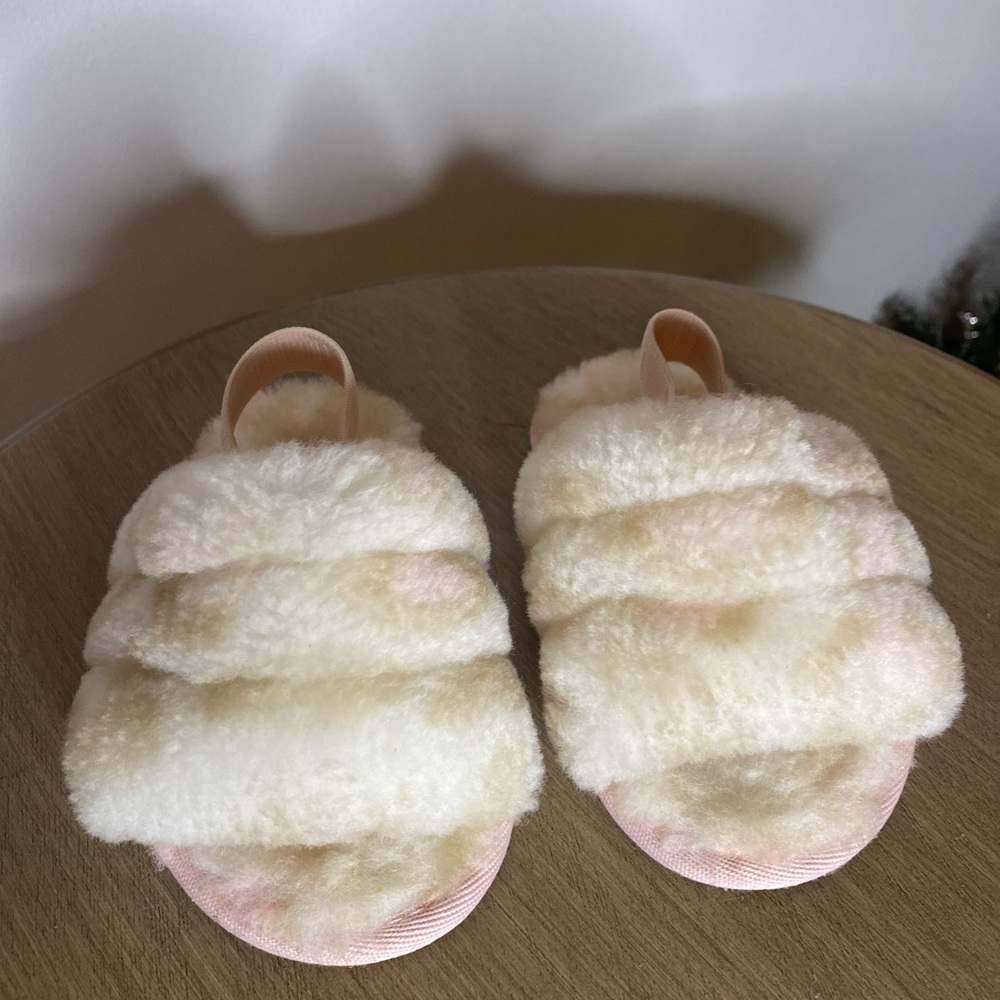 Ugg infant slipper size 6, pink, cream, brown, leopard like print.  Like new